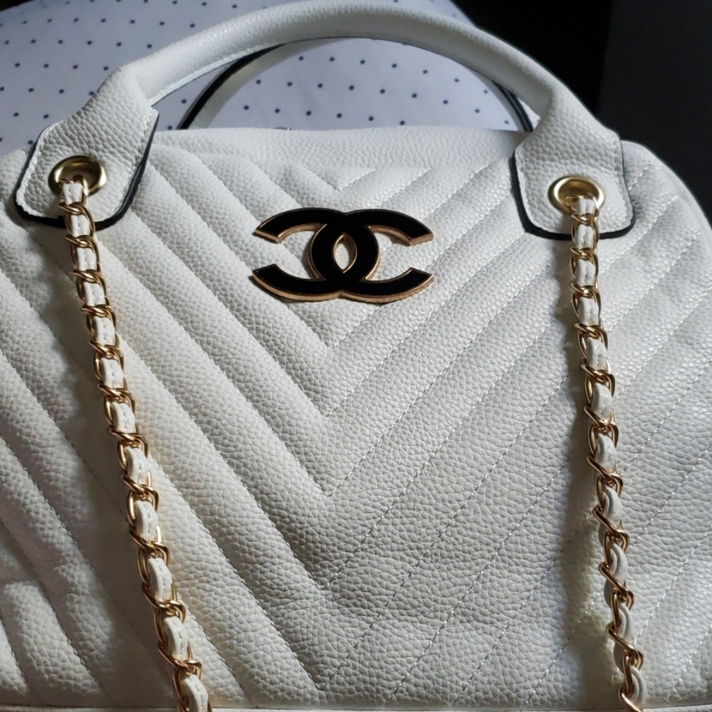 white medium purse with strap